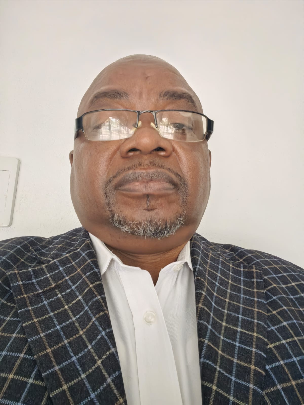 Professional portrait of a man in business attire